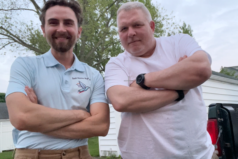 Two-men-posing Picture are two men posing with their arms crossed smiling.